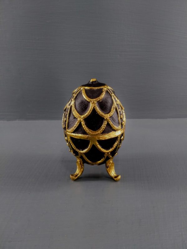 Egg sort gull med snor Filipiniana