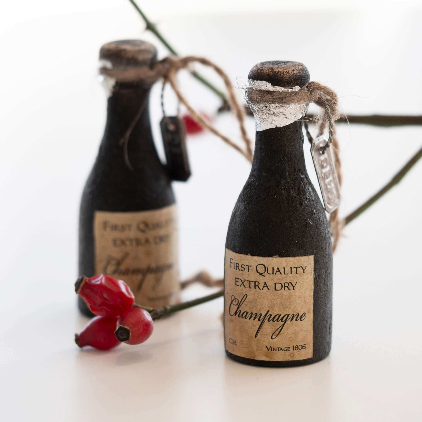 Julepynt champagne flaske Deus Living