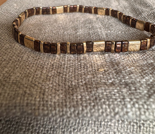 Armbånd brunt gull Nordic icon